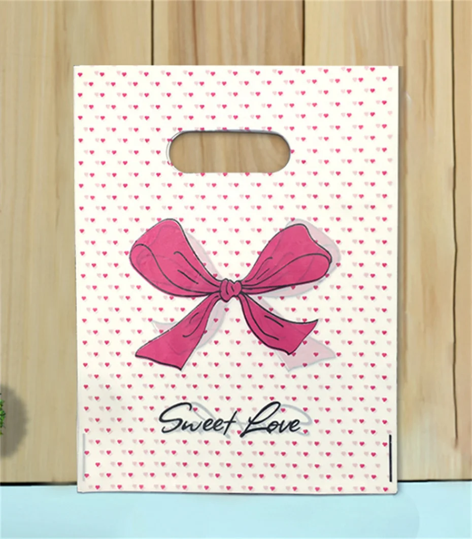 100Pcs Shopping Business Packaging Bag Plastic Gift Bags Printed Clothes Decoration Candy Cake Jewelry Birthday Gift Pouch M8888